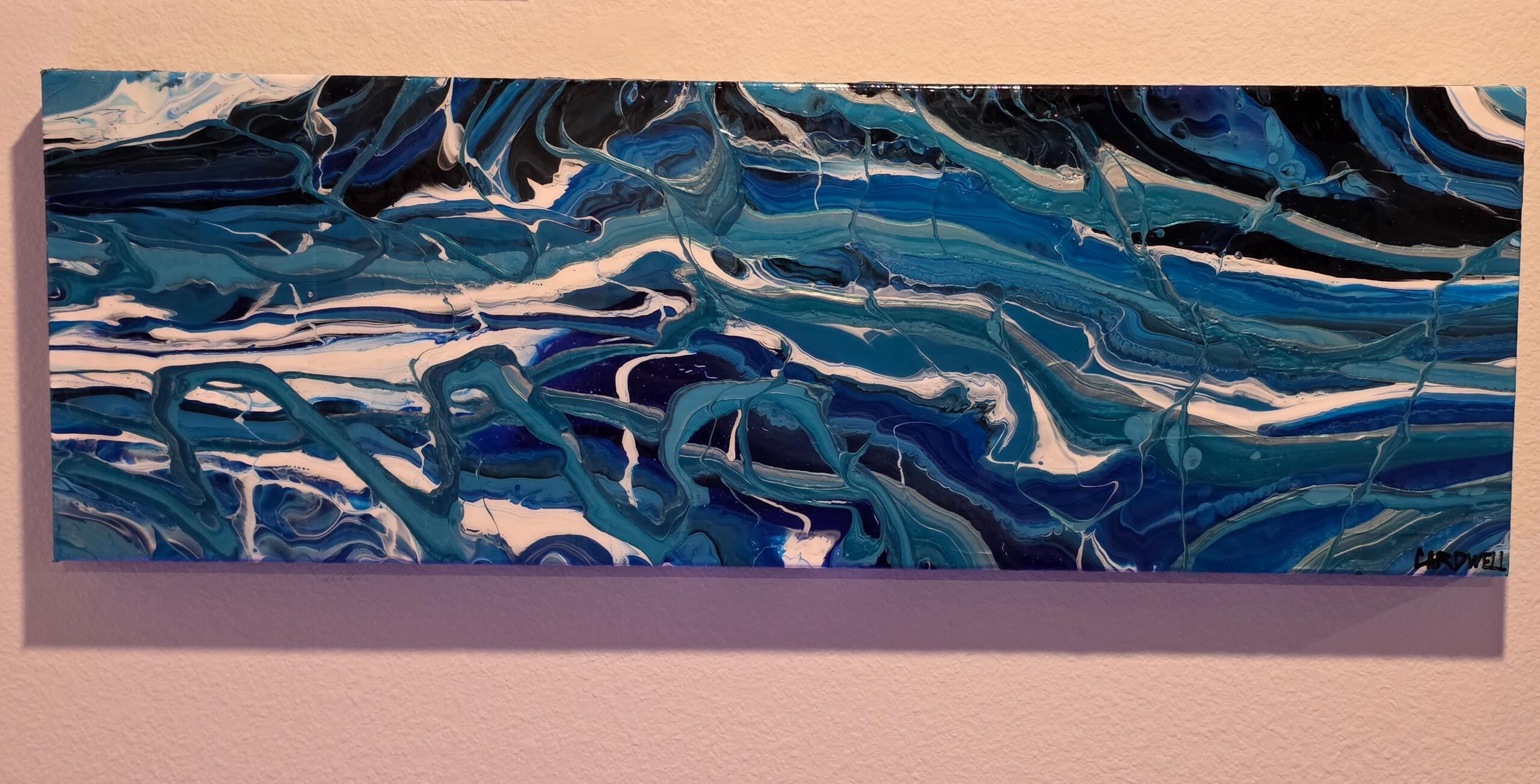 Sea Wolf acrylic paint fluid art, blues, swirl ruthless with white and black reminiscent of orcas on the hunt.